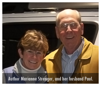 A man and woman standing next to each other.